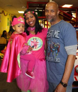 Super Quinn with her Super Mommy and Daddy