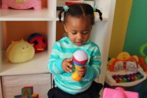 Quinn and her musical maraca