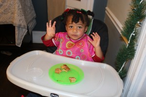 Quinn Eating Her Grilled Cheese Sandwich With Baby Spinach and Tomato