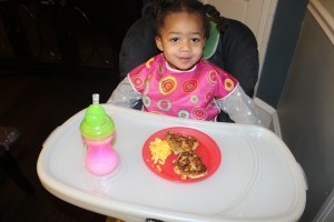 Quinn with her heart shaped French toast and scrambled eggs.
